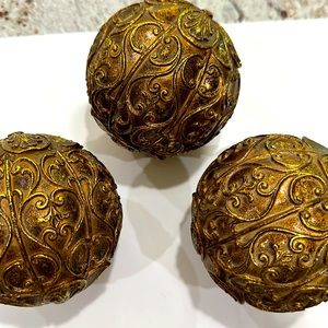 3 Elegant, decorative gold balls. They are around 4” in diameter, $38